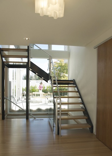 entry with stair and courtyard beyond